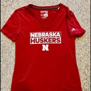 Like new red Adidas Husker T. Size medium
